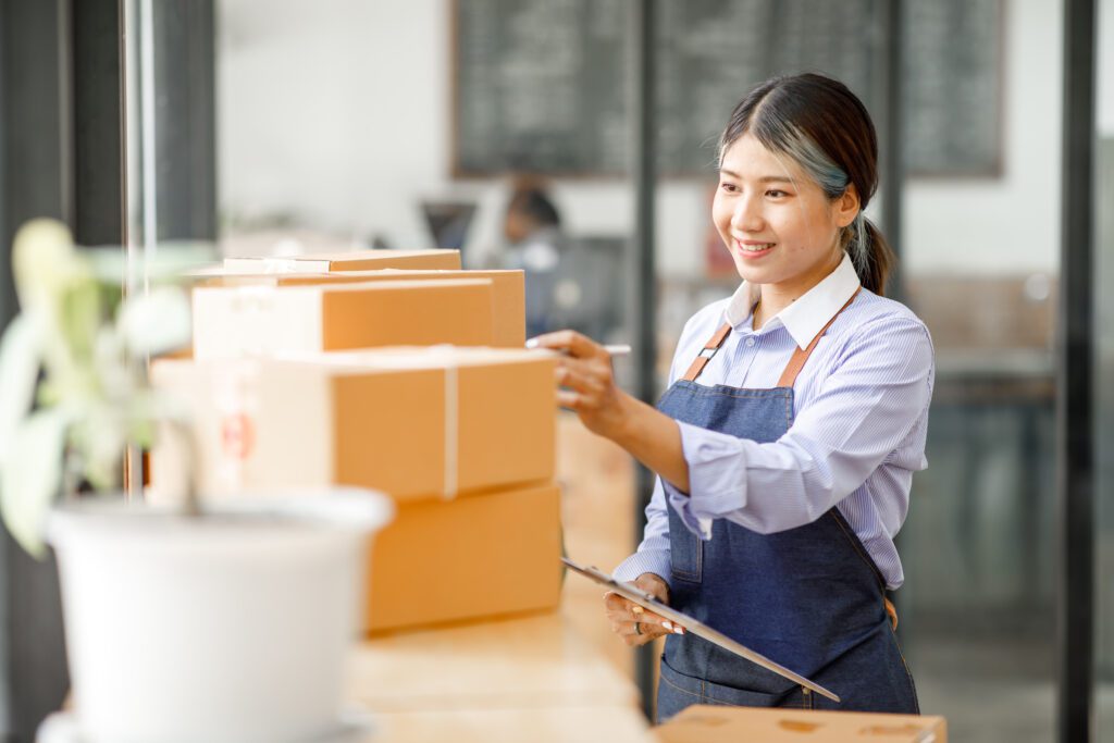 e-commerce business scalability woman fulfilling orders